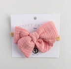 Happy Parrot rusettipanta sävyssä Soft Blush